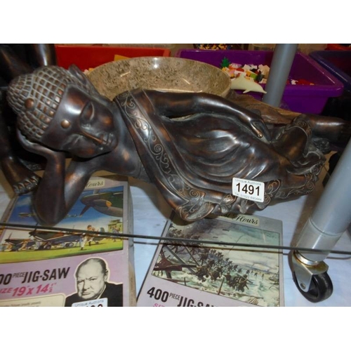 1491 - Two Resin Buddha's, a marble bowl and a John Perry dolphin figure.