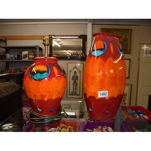 1492 - A Poole pottery Volcano 36cm Manhattan vase and a ginger jar lamp.