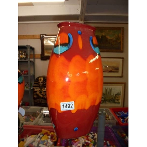 1492 - A Poole pottery Volcano 36cm Manhattan vase and a ginger jar lamp.