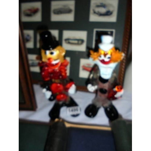 1496 - A pair of Murano glass clowns.