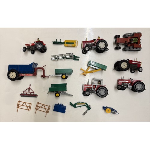 1461 - Four trays of unboxed Britains tractors, implements and farm animals etc.,