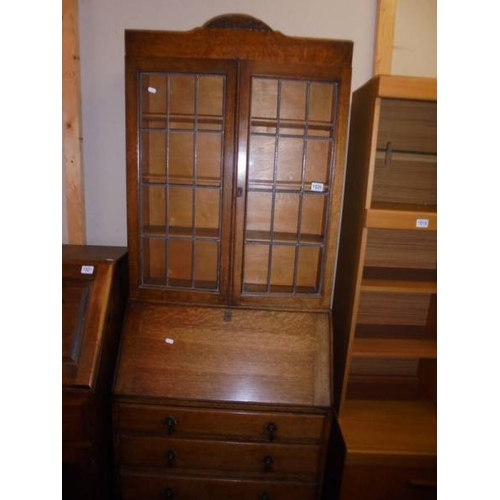 1520 - A good oak lead glazed bureau bookcase.