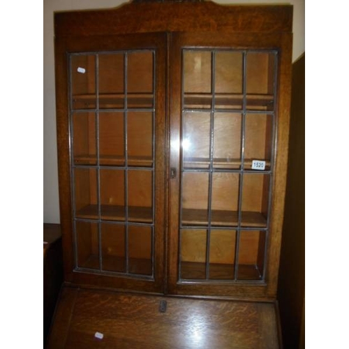 1520 - A good oak lead glazed bureau bookcase.