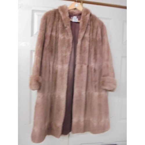 1552 - A vintage Brown of Chester fur coat.