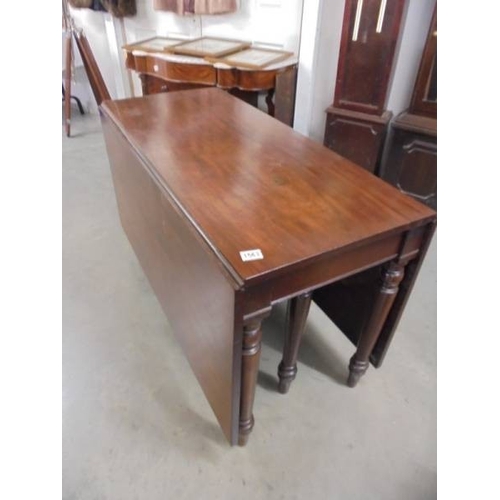 1563 - A large mahogany drop side table.