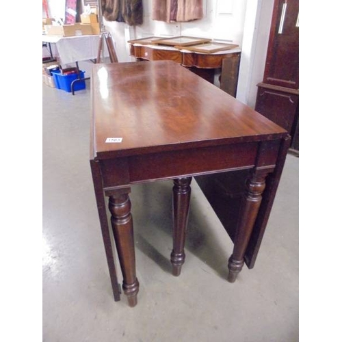 1563 - A large mahogany drop side table.