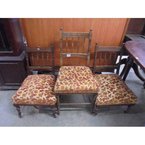 1565 - Two Edwardian nursing chairs and a matching bedroom chair.