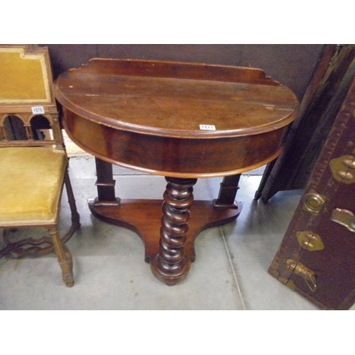 1571 - A Victorian mahogany hall table with barley twist supports.