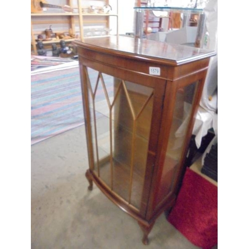 1579 - A mahogany inlaid display cabinet with astragal glazed door.