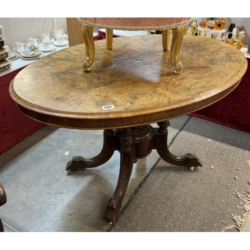 1581 - A Victorian mahogany tea table with birdcage base