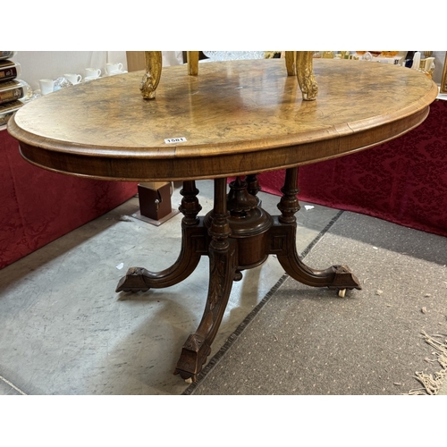 1581 - A Victorian mahogany tea table with birdcage base