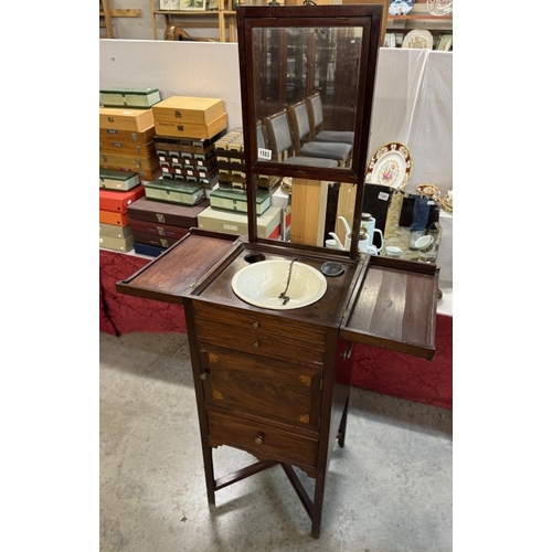 1583 - A Victorian inlaid mahogany travelling wash stand