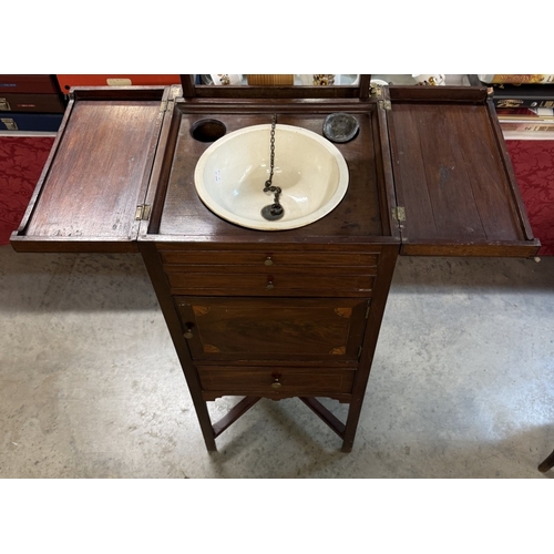 1583 - A Victorian inlaid mahogany travelling wash stand