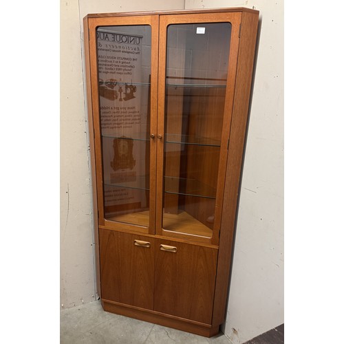 1530A - A retro teak corner cupboard