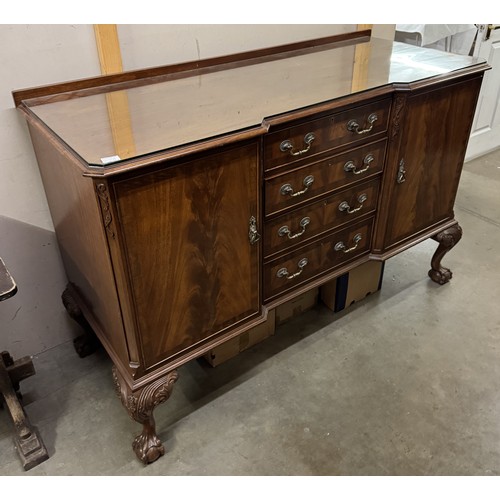 1530B - A large Edwardian mahogany sideboard with cupboard & drawers on ball & claw feet