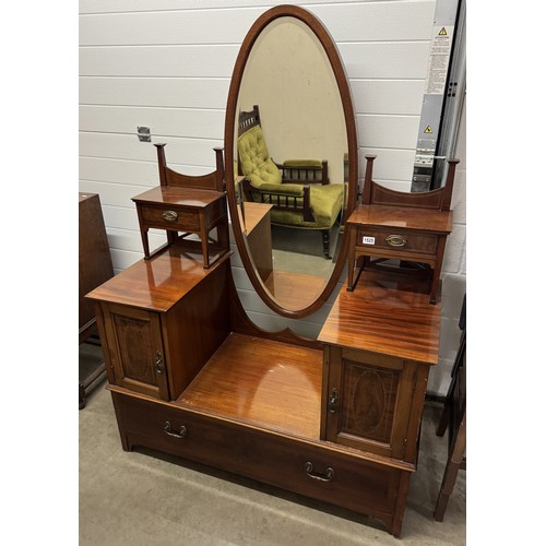 1525 - An impressive Edwardian mahogany inlaid dressing table with oval mirror.