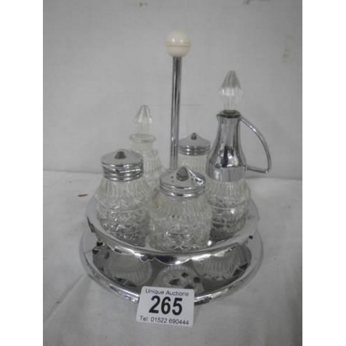 265 - A Retro condiment set, complete.