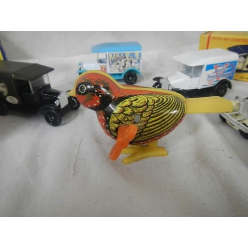 275 - A mixed lot of die cast vehicles.