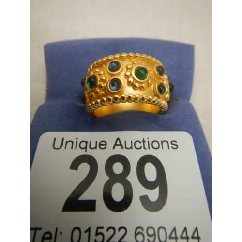 289 - A boxed dress ring.