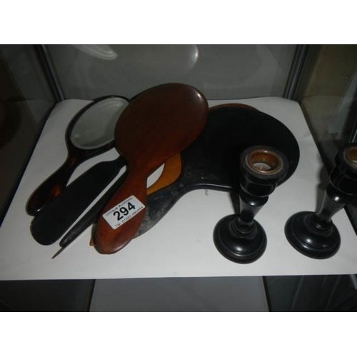 294 - A quantity of old hand mirrors, candlestick etc.