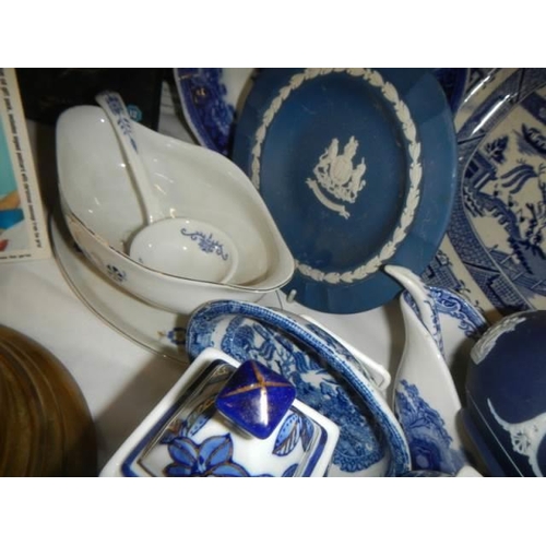 20 - A quantity of blue and white ceramics including meat platter.