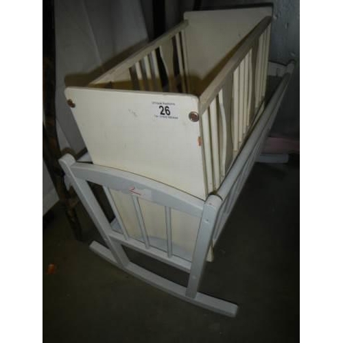 26 - Two old dolls cots.