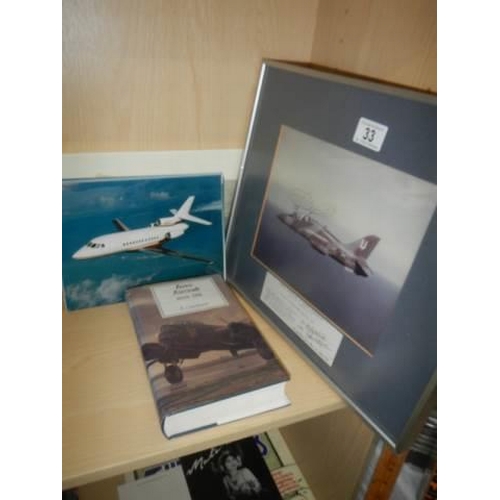 33 - A framed & glazed signed Harrier print and a quantity of unframed aeronautical prints