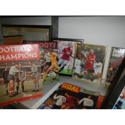 51 - A quantity of football related books etc.,