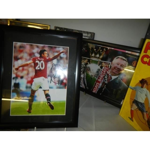 51 - A quantity of football related books etc.,