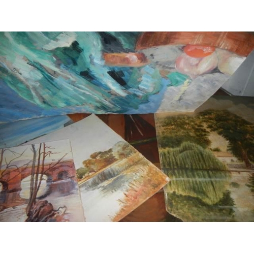 56 - A large quantity of unframed oil on board paintings.