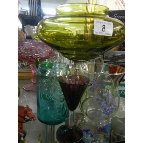 8 - A quantity of old clear and coloured glass.