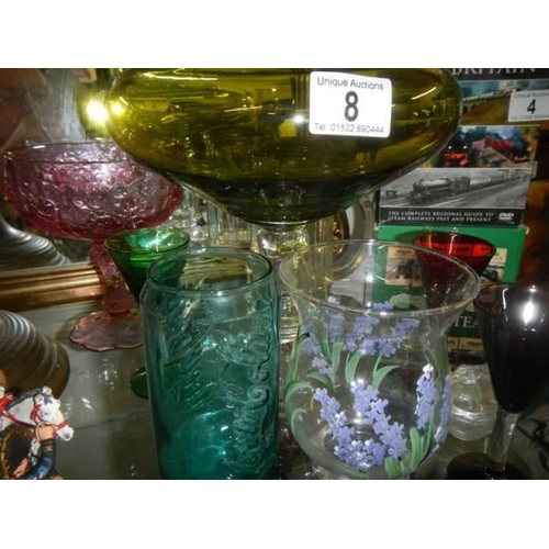 8 - A quantity of old clear and coloured glass.