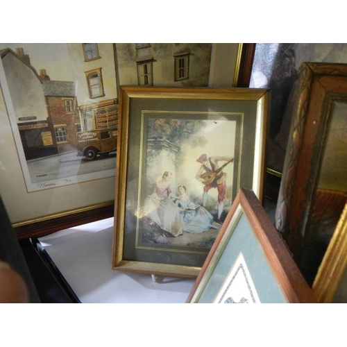 58 - A good lot of framed and glazed prints etc.,
