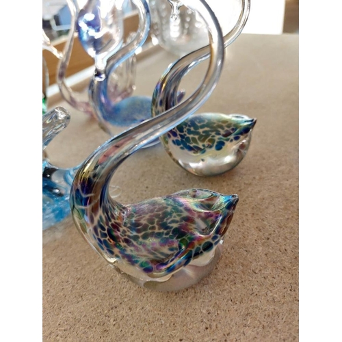 179 - A quantity of Heron glass swans etc