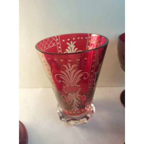 208 - A Rorstrand Sweden ruby jug and 5 ruby / red glasses