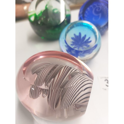 396 - 7 Window paperweights
