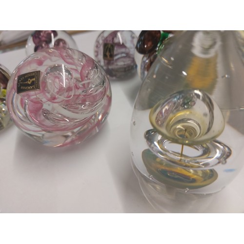 398 - 7 Langham paperweights