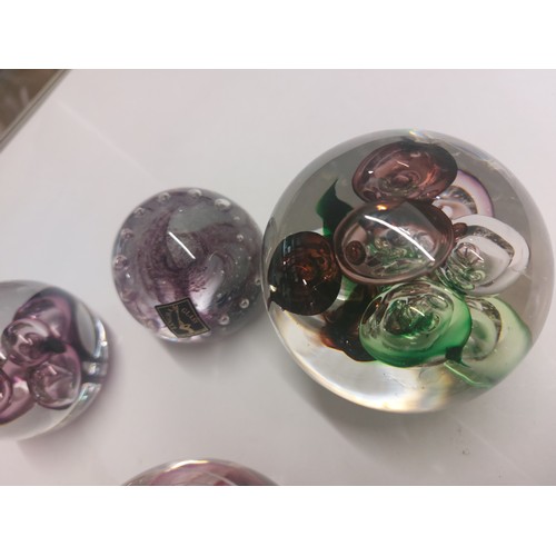 398 - 7 Langham paperweights