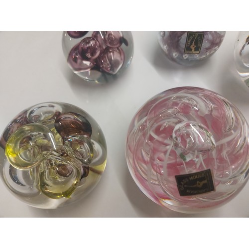 398 - 7 Langham paperweights