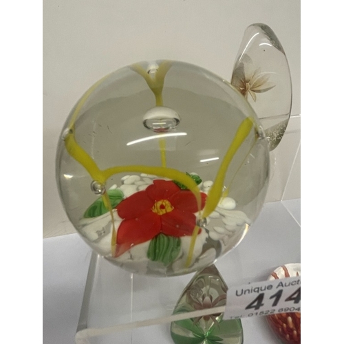 414 - 8 Flower paperweights
