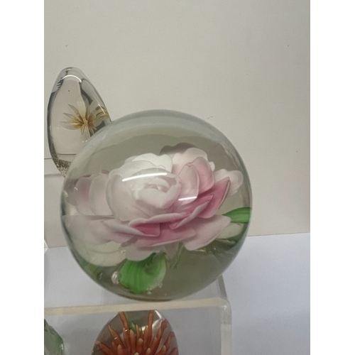 414 - 8 Flower paperweights