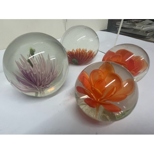 414 - 8 Flower paperweights