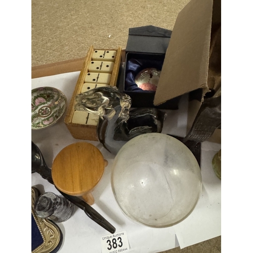 383 - A shelf of miscellaneous items including a paperweight, photo frames, a phone etc