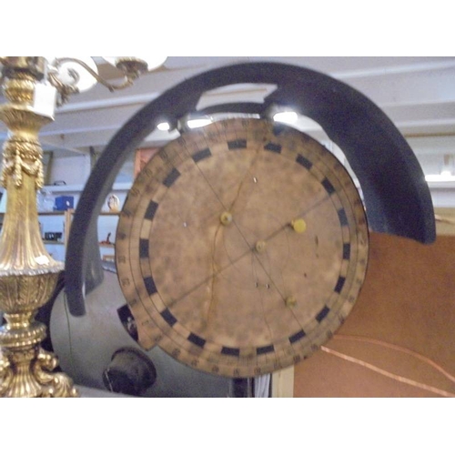 A rare Hartl style optical disc on cast metal stand (late 19th/early ...