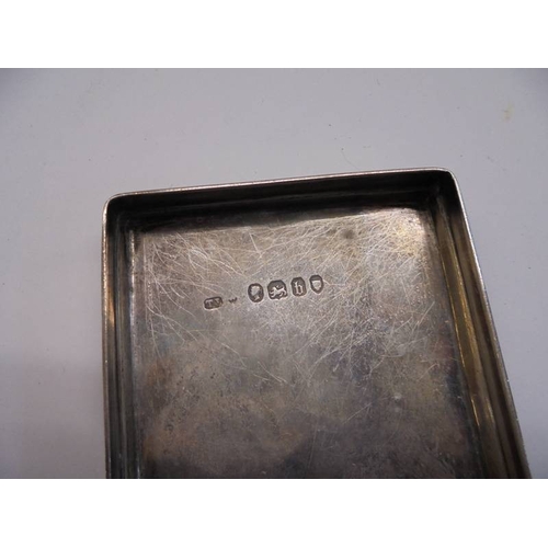 48 - A hall marked silver top for a glass dressing table box.