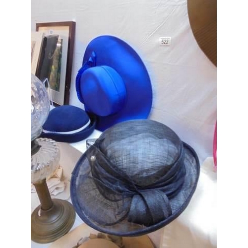 522 - A quantity of mid 20th century hats, etc.,