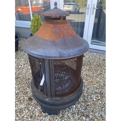 29 - A large metal burner-oven-barbecue.