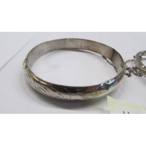 44 - Two silver bangles.