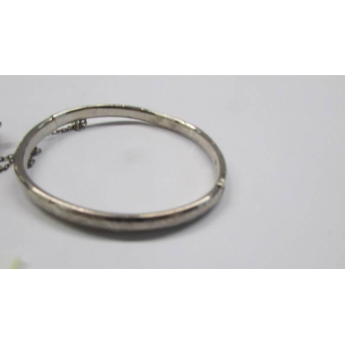 44 - Two silver bangles.