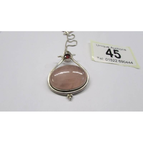 45 - A silver pendant.